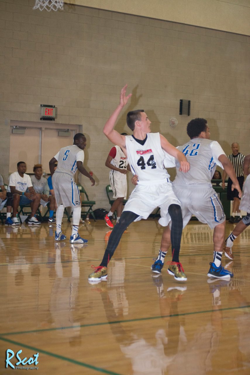 Mitch Lightfoot can also post up around the basket with his size at 6'9" and 200 (Robert Scot/AllSportsTucson.com)