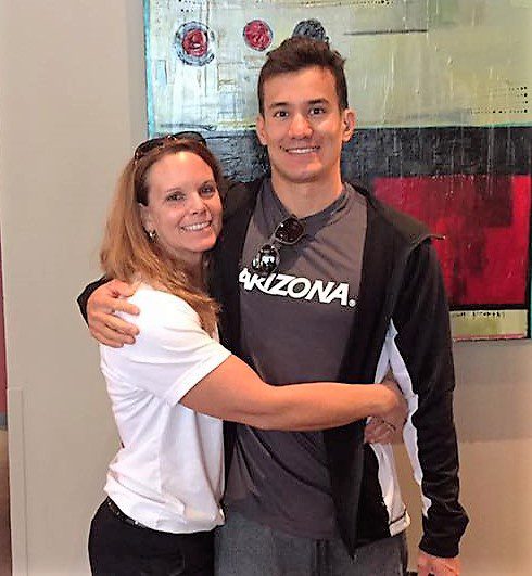 Former University of Arizona swimmer & Flowing Wells swim coach Becki Peduchi Major with Marcus Titus (Courtesy Photo)