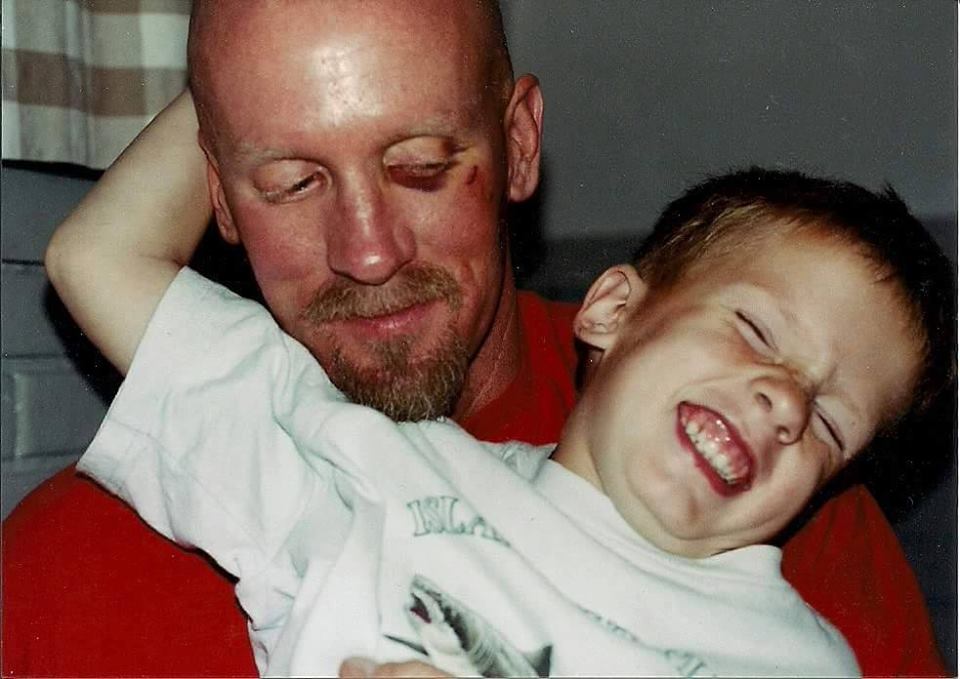 Jay Dobyns with a black eye playing  with his young son Jack (Dobyns family photo)