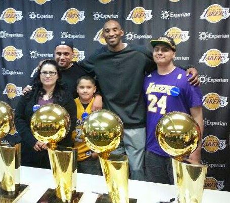 Kobe Bryant with all his trophies